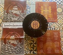 Load image into Gallery viewer, Vinyl record with cover and additional materials on a patterned surface