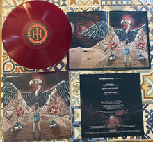 Load image into Gallery viewer, Vinyl record with cover and additional artwork on a patterned surface