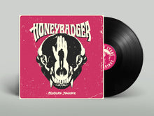 Load image into Gallery viewer, Vinyl record with pink cover featuring a skull design and 'Honeybadger' text.