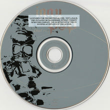 Load image into Gallery viewer, CD with a skull design and promotional text on a gray background