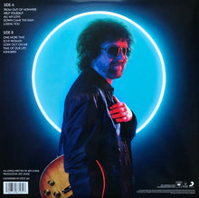 Cargar imagen en el visor de la galería, Album cover with a person holding a guitar, illuminated by a blue circle, on a dark background.