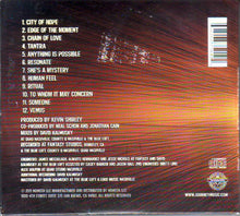 Cargar imagen en el visor de la galería, Back cover of a music album with tracklist and production credits on a red and orange gradient background.