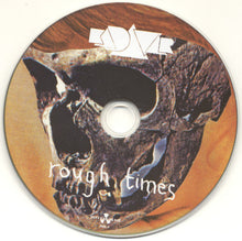 Load image into Gallery viewer, CD with a skull design and 'tough times' text on a wooden-textured background