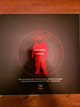 Cargar imagen en el visor de la galería, Vinyl record cover with red silhouette of a person and 'Moon People Universe' text on a dark background.
