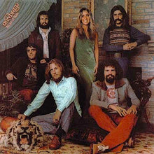 Cargar imagen en el visor de la galería, A CD cover featuring members of the band Kindred with a female vocalist in the center, surrounded by male members in various poses. The band is seated and standing against a rustic background, with a cat on the floor in front of them.
