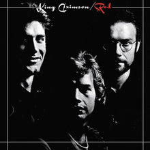 Charger l'image dans la galerie, Album cover of King Crimson's 'Red' with black and white portraits on a dark background.