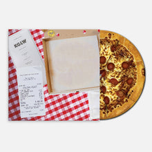 Cargar imagen en el visor de la galería, Pizza with pepperoni and mushroom toppings on a wooden board, next to a checkered napkin and a menu.