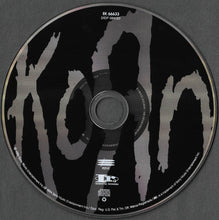 Load image into Gallery viewer, CD with &#39;Korn&#39; branding on a dark background