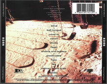 Load image into Gallery viewer, Album cover with kids park design and tracklist for Korn&#39;s &#39;Inferiority Complex&#39;.