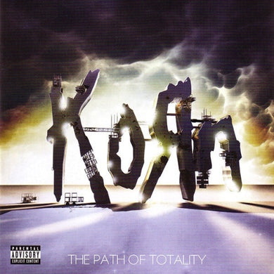 Album cover for 'The Path of Totality' by Korn with stylized text and industrial elements.