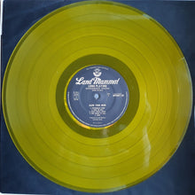 Charger l'image dans la galerie, Yellow vinyl record with a blue label on a dark blue background