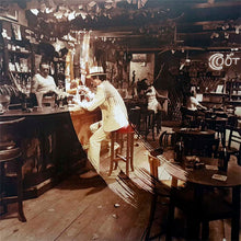 Cargar imagen en el visor de la galería, Dramatic interior of a bar with patrons and decor