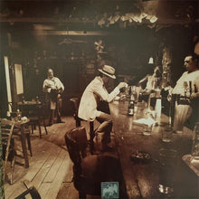 Cargar imagen en el visor de la galería, Vintage-style bar scene with patrons and a bartender.