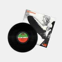 Charger l'image dans la galerie, Vinyl record with a black cover featuring a tree design on a white background