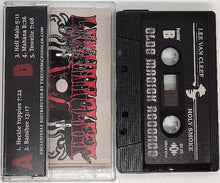 Cargar imagen en el visor de la galería, Cassette tape with red and black design on the label, featuring text and graphics.