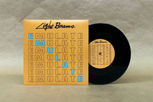Load image into Gallery viewer, Vinyl record with matching cover featuring 'Light Beams' branding on a gray background