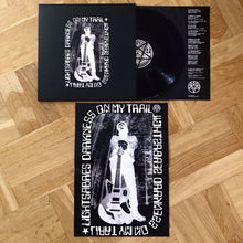 Charger l&#39;image dans la galerie, Vinyl record with cover and insert on a wooden floor