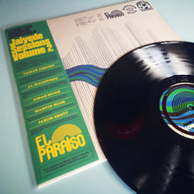 Charger l&#39;image dans la galerie, Vinyl record and cover with &#39;El Paraiso&#39; branding on a light blue background