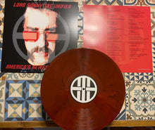 Charger l&#39;image dans la galerie, Vinyl record with a cover featuring a man&#39;s face and text on a patterned surface