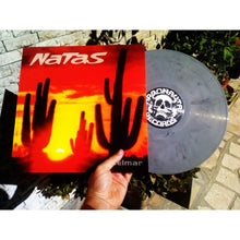 Charger l'image dans la galerie, Vinyl record with a red cover featuring black silhouettes and a visible label.