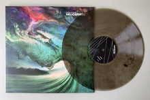 Charger l'image dans la galerie, Vinyl record with a colorful cover titled 'Heliosphere' on a white background