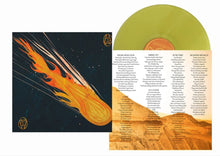 Load image into Gallery viewer, Vinyl record with a fiery comet design on the cover and desert landscape on the inside.