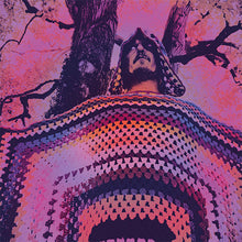 Cargar imagen en el visor de la galería, Person wearing a colorful, patterned sweater with a tree in the background