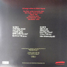 Charger l&#39;image dans la galerie, Back cover of a vinyl record with track listing and credits on a dark background