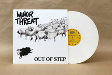 Cargar imagen en el visor de la galería, Vinyl record and cover with 'Minor Threat' branding on a brown background