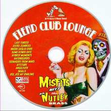 Load image into Gallery viewer, Disc with 'Fiend Club Lounge' design featuring a woman and a skeleton, with text and logos.