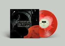 Load image into Gallery viewer, Vinyl record with red disc and black and orange cover featuring &#39;Moneque Amara&#39; on a gray background