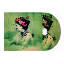 Charger l'image dans la galerie, CD with artistic design of a woman with flowers in her hair on a green background
