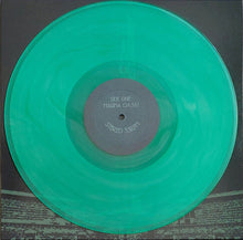 Charger l'image dans la galerie, Green vinyl record with label on a dark background