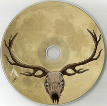 Charger l'image dans la galerie, CD with a deer skull and antlers design on a beige background