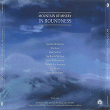 Charger l&#39;image dans la galerie, Album cover for &#39;Mountain of Misery In Roundness&#39; with a blue cloudy sky design.
