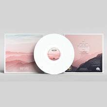 Charger l'image dans la galerie, White vinyl record with pink and blue design on a gray background