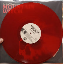 Load image into Gallery viewer, Red vinyl record with 'Mountain Witch' and 'Burning Village' text on a gray background