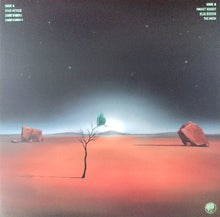 Load image into Gallery viewer, Album cover with desert landscape, tree, and light source