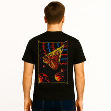 Load image into Gallery viewer, Person wearing a black t-shirt with a colorful graphic on the back, standing against a white background