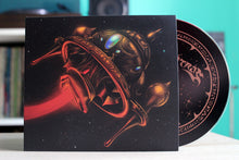 Cargar imagen en el visor de la galería, Compact disc with a detailed cover featuring a helmet design.