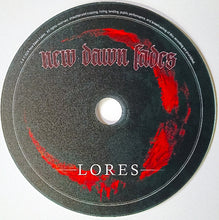 Charger l'image dans la galerie, A circular black CD or vinyl record sleeve with a center hole, featuring the text 'new dawn fades' in red gothic lettering and 'LORES' in white at the bottom, plus red painted brushstroke graphics on a black background.