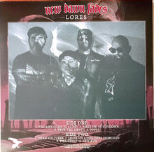 Cargar imagen en el visor de la galería, Album cover with four individuals and text about 'New Dawn Fades' and 'Lores'.