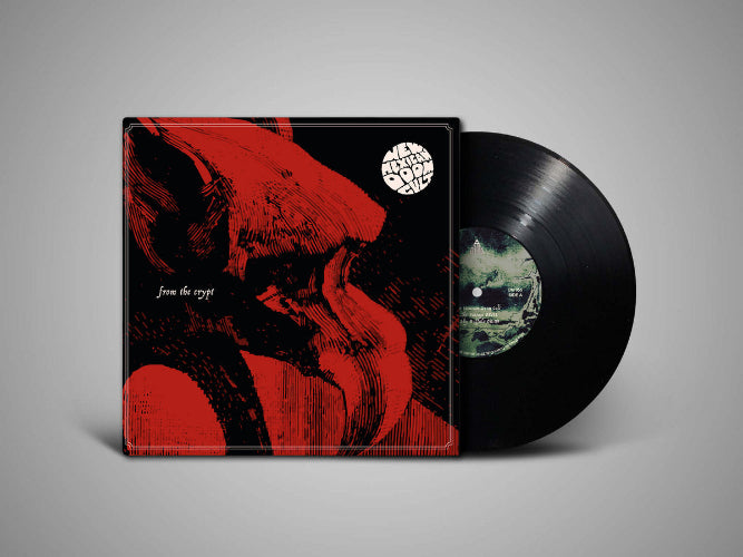 Vinyl record with a red and black cover on a gray background