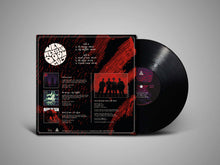 Cargar imagen en el visor de la galería, Vinyl record with a red and black cover on a gray background