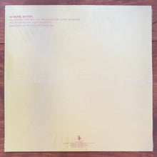 Load image into Gallery viewer, Album cover with text on a wooden surface