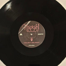 Load image into Gallery viewer, Vinyl record with a label featuring the text 'Nigght Nigght' and 'Violent Delicacy'.