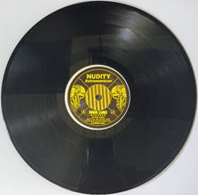 Charger l&#39;image dans la galerie, Vinyl record with a yellow label on a white background
