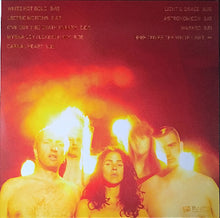 Charger l&#39;image dans la galerie, Album cover with four people in front of a red and yellow light effect