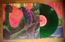 Cargar imagen en el visor de la galería, Vinyl record with a colorful cover featuring a bear and trees on a wooden surface