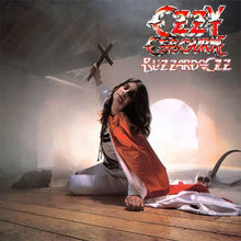 Charger l'image dans la galerie, Album cover with a person holding a cross, surrounded by fog and rustic elements, featuring the 'Blizzard of Ozz' album title.